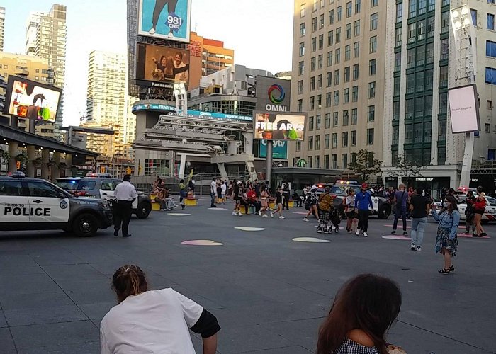 Yonge-Dundas Square Anyone know why police are swarming Dundas Square? I see nothing ... photo