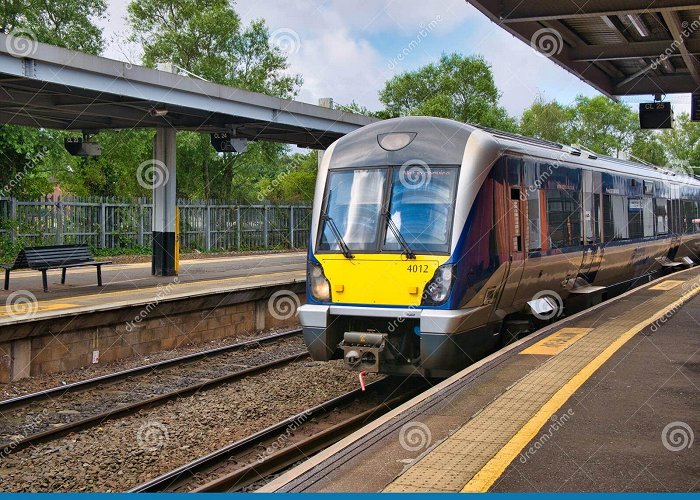 Lanyon Place Station A Local Commuter Train Arrives at a Deserted Platform at Lanyon ... photo