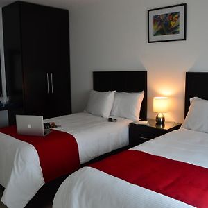 Clamont Suites Culiacan Room photo