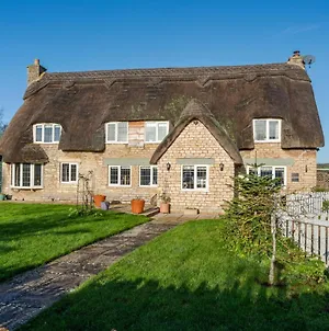 The Thatch House Woolstone  Exterior photo